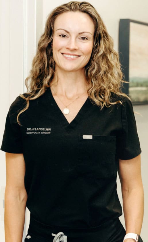 Dr. Langelier Standing Beside Her Office Background