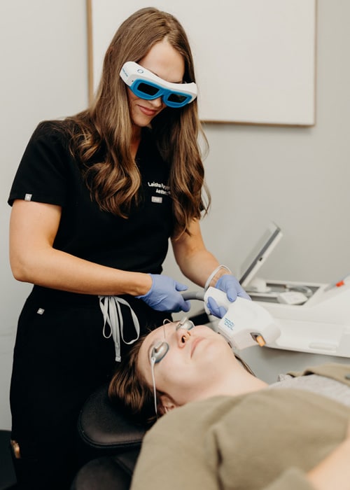 Leisha examining patient on procedure of Sction BBL