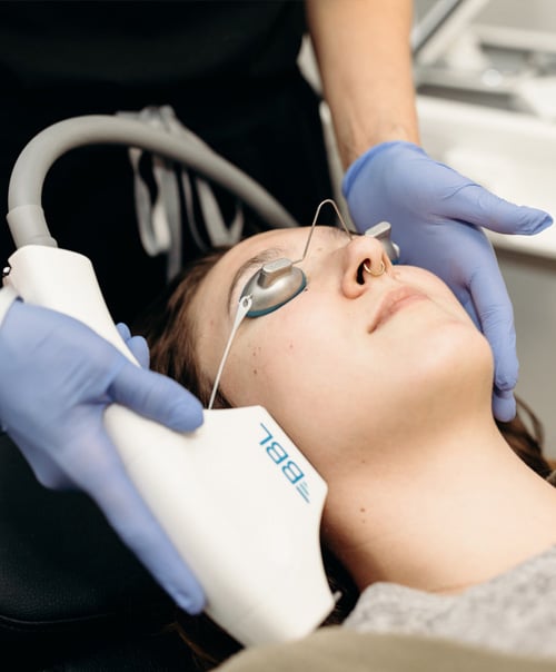 stock image of doctor examining her patient